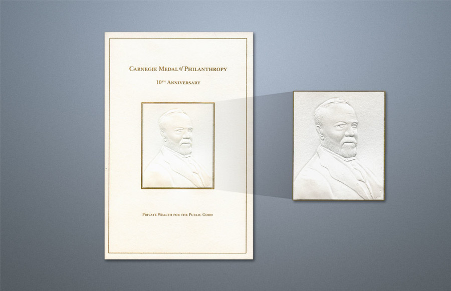 benchmark-carnegie-corp-of-america1 2011 Awards 8 Part Invitation Set: Invitation: Open size 21 3/8" x 8" with 1 side glued, fold-in panel and facing diagonal glued pocket. All engraved in black and gold. Score and final fold to 5 ¼" x 8" on 110# Lettra Pearl white cover. Cover features custom multi-level die.