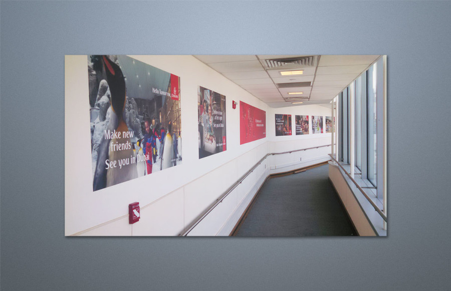 Emirates JFK Jetway: Imaging and installation of 15 posters of various sizes for Emirates JFK jetway. Imaging of art on white SAV (self-adhesive vinyl).