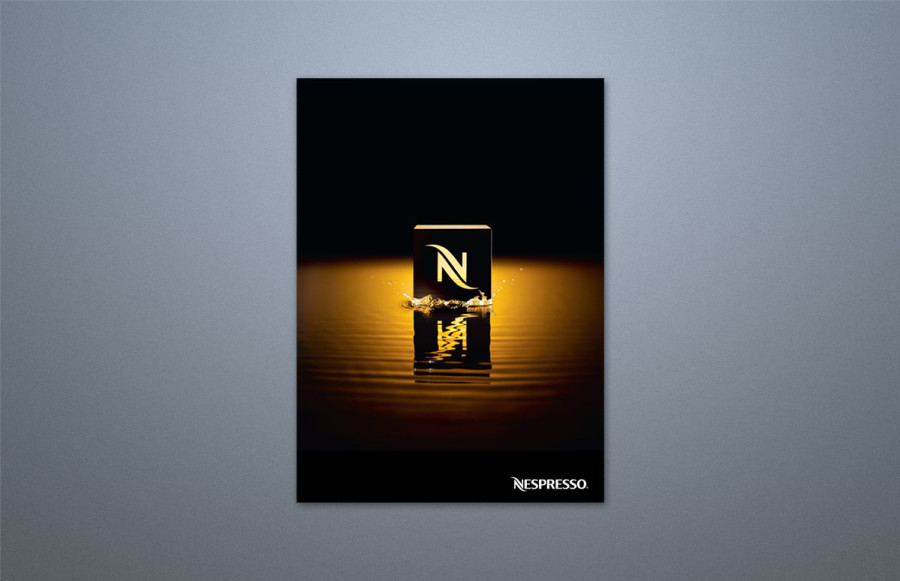 benchmark-nespresso1 56 page + cover book: 8 11/16" x 11 7/8" trim size. Printing 4 color process + aqueous coating throughout. Cover: Open size at 22" x 11.875" (17 3/8" spread plus 4 3/8" vertical pocket on back cover). Job prints on 130# Creator Silk Cover with text printing 100# Creator Silk Text. Cover is die cut and glued to 4 3/8" wide x 11 7/8" (full spine) with business card slits.