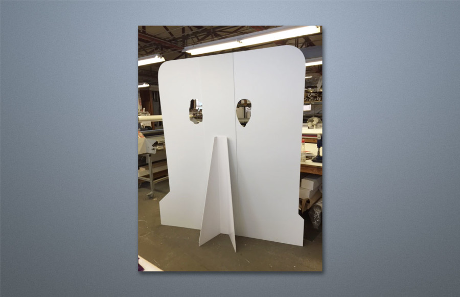 Lobby Display: Standee created for theatre-goers to use to have their pictures taken through the cut outs in the display.  We imaged the 83” x 72” as two separate pieces up to 3’ x 8’ on ½” Ultra Board and held together with heavy duty construction tape.