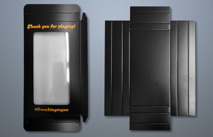 Candy Crush Custom Phone Shipper: 250 custom boxes with tray. Open size 9 ¼ x 10 ½, closes to 4 3/8 x 7 5/8.  Box and tray print 4 color process on 16pt. white board.   Box prints one side, tray prints 2 sides.  Box gets a 6pt clear, polished acetate window.  Die cut, glue score, delivers flat.